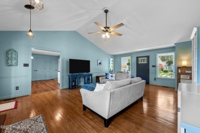 Welcome to this beautiful 3-bedroom, 2-bath home nestled in the on Harbour Point Golf Club in North Carolina - for sale on GolfHomes.com, golf home, golf lot