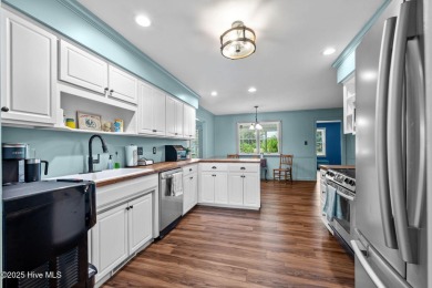 Welcome to this beautiful 3-bedroom, 2-bath home nestled in the on Harbour Point Golf Club in North Carolina - for sale on GolfHomes.com, golf home, golf lot
