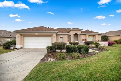 Beautiful Hampton model with concrete block construction located on Eagle Ridge At Spruce Creek Country Club in Florida - for sale on GolfHomes.com, golf home, golf lot