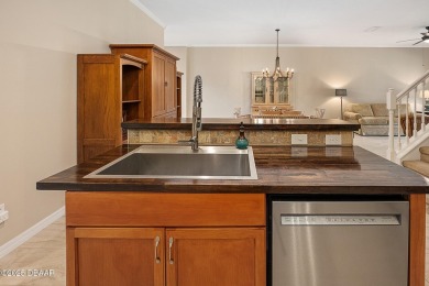 Welcome to this beautifully updated and move-in ready, partially on Plantation Bay Golf and Country Club in Florida - for sale on GolfHomes.com, golf home, golf lot