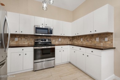 Welcome to this beautifully updated and move-in ready, partially on Plantation Bay Golf and Country Club in Florida - for sale on GolfHomes.com, golf home, golf lot