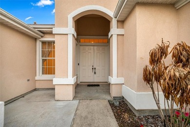 Beautiful Hampton model with concrete block construction located on Eagle Ridge At Spruce Creek Country Club in Florida - for sale on GolfHomes.com, golf home, golf lot