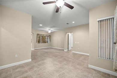 Beautiful Hampton model with concrete block construction located on Eagle Ridge At Spruce Creek Country Club in Florida - for sale on GolfHomes.com, golf home, golf lot