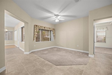 Beautiful Hampton model with concrete block construction located on Eagle Ridge At Spruce Creek Country Club in Florida - for sale on GolfHomes.com, golf home, golf lot