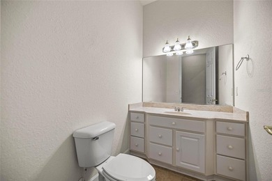 Beautiful Hampton model with concrete block construction located on Eagle Ridge At Spruce Creek Country Club in Florida - for sale on GolfHomes.com, golf home, golf lot