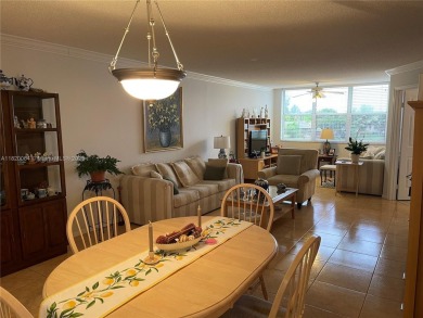 Welcome home to this spacious, remodeled unit in the highly on Sunrise Lakes Phase IV Golf Course in Florida - for sale on GolfHomes.com, golf home, golf lot