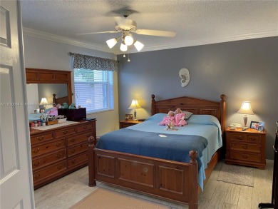 Welcome home to this spacious, remodeled unit in the highly on Sunrise Lakes Phase IV Golf Course in Florida - for sale on GolfHomes.com, golf home, golf lot