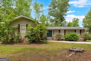 Discover this charming 3-bedroom, 2-bath ranch-style home on Fairfield Plantation Golf and Country Club in Georgia - for sale on GolfHomes.com, golf home, golf lot
