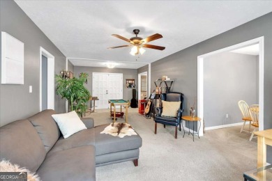 Discover this charming 3-bedroom, 2-bath ranch-style home on Fairfield Plantation Golf and Country Club in Georgia - for sale on GolfHomes.com, golf home, golf lot