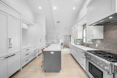 Turnkey sophisticated luxury! Unparalleled, high-end on Bocaire Country Club in Florida - for sale on GolfHomes.com, golf home, golf lot