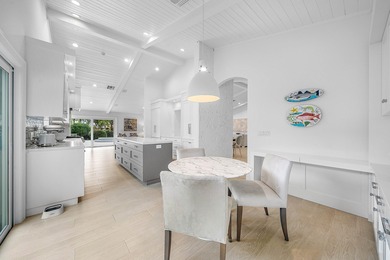 Turnkey sophisticated luxury! Unparalleled, high-end on Bocaire Country Club in Florida - for sale on GolfHomes.com, golf home, golf lot