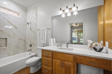 Nestled in a serene location backing up to the Lake Waco Golf on The Lake Country Club - Lake Waco in Texas - for sale on GolfHomes.com, golf home, golf lot