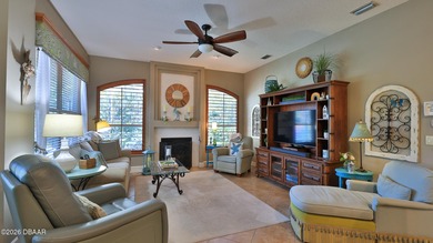 Warm and inviting 4 BR pool home with lake and fountain view on Plantation Bay Golf and Country Club in Florida - for sale on GolfHomes.com, golf home, golf lot