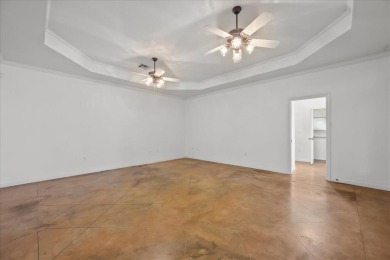 Nestled in a serene location backing up to the Lake Waco Golf on The Lake Country Club - Lake Waco in Texas - for sale on GolfHomes.com, golf home, golf lot