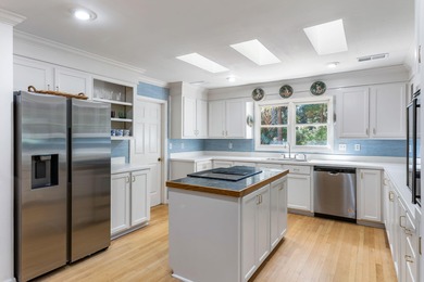 Classic and elegantly designed home with French provincial style on The Seabrook Island Club in South Carolina - for sale on GolfHomes.com, golf home, golf lot