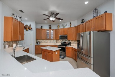 Welcome home to this beautifully appointed home located just on Burnt Store Golf Club in Florida - for sale on GolfHomes.com, golf home, golf lot