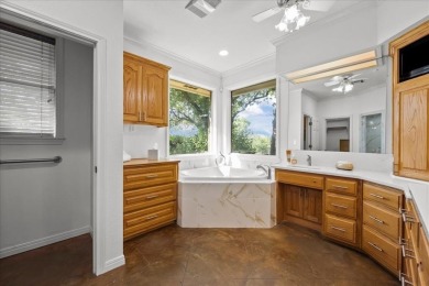 Nestled in a serene location backing up to the Lake Waco Golf on The Lake Country Club - Lake Waco in Texas - for sale on GolfHomes.com, golf home, golf lot