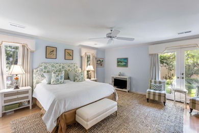 Classic and elegantly designed home with French provincial style on The Seabrook Island Club in South Carolina - for sale on GolfHomes.com, golf home, golf lot