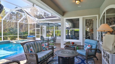 Warm and inviting 4 BR pool home with lake and fountain view on Plantation Bay Golf and Country Club in Florida - for sale on GolfHomes.com, golf home, golf lot