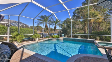 Warm and inviting 4 BR pool home with lake and fountain view on Plantation Bay Golf and Country Club in Florida - for sale on GolfHomes.com, golf home, golf lot