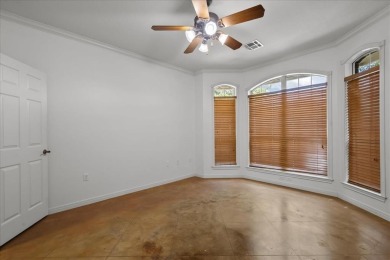 Nestled in a serene location backing up to the Lake Waco Golf on The Lake Country Club - Lake Waco in Texas - for sale on GolfHomes.com, golf home, golf lot