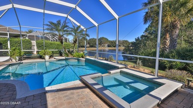 Warm and inviting 4 BR pool home with lake and fountain view on Plantation Bay Golf and Country Club in Florida - for sale on GolfHomes.com, golf home, golf lot
