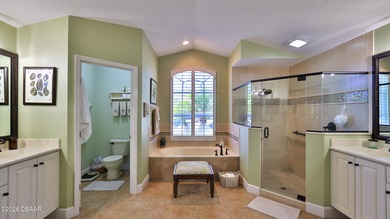 Warm and inviting 4 BR pool home with lake and fountain view on Plantation Bay Golf and Country Club in Florida - for sale on GolfHomes.com, golf home, golf lot