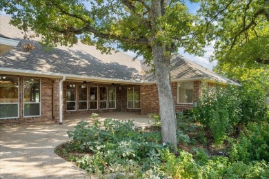 Nestled in a serene location backing up to the Lake Waco Golf on The Lake Country Club - Lake Waco in Texas - for sale on GolfHomes.com, golf home, golf lot