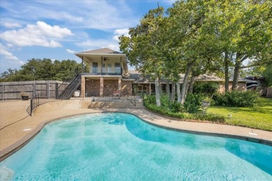Nestled in a serene location backing up to the Lake Waco Golf on The Lake Country Club - Lake Waco in Texas - for sale on GolfHomes.com, golf home, golf lot