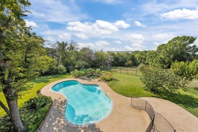 Nestled in a serene location backing up to the Lake Waco Golf on The Lake Country Club - Lake Waco in Texas - for sale on GolfHomes.com, golf home, golf lot