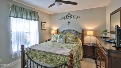 Warm and inviting 4 BR pool home with lake and fountain view on Plantation Bay Golf and Country Club in Florida - for sale on GolfHomes.com, golf home, golf lot