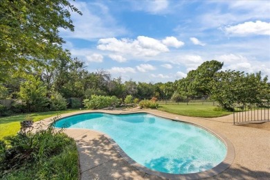 Nestled in a serene location backing up to the Lake Waco Golf on The Lake Country Club - Lake Waco in Texas - for sale on GolfHomes.com, golf home, golf lot