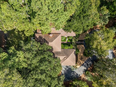 Classic and elegantly designed home with French provincial style on The Seabrook Island Club in South Carolina - for sale on GolfHomes.com, golf home, golf lot