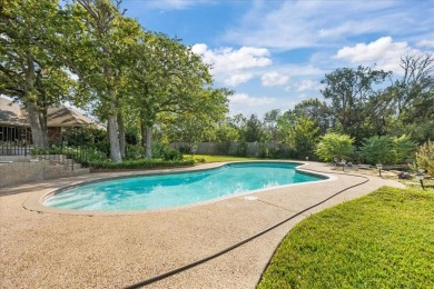 Nestled in a serene location backing up to the Lake Waco Golf on The Lake Country Club - Lake Waco in Texas - for sale on GolfHomes.com, golf home, golf lot