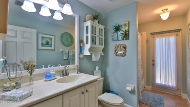 Warm and inviting 4 BR pool home with lake and fountain view on Plantation Bay Golf and Country Club in Florida - for sale on GolfHomes.com, golf home, golf lot