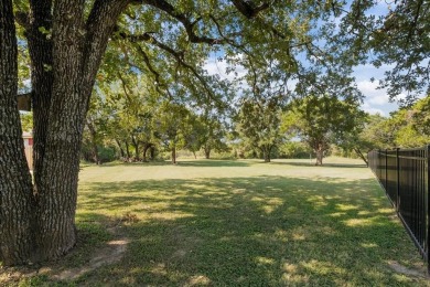Nestled in a serene location backing up to the Lake Waco Golf on The Lake Country Club - Lake Waco in Texas - for sale on GolfHomes.com, golf home, golf lot