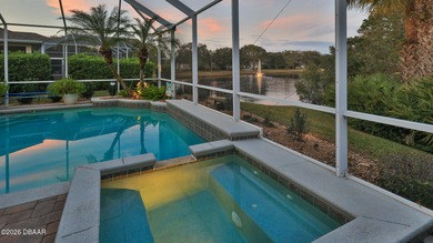 Warm and inviting 4 BR pool home with lake and fountain view on Plantation Bay Golf and Country Club in Florida - for sale on GolfHomes.com, golf home, golf lot