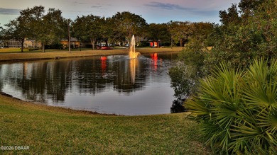 Warm and inviting 4 BR pool home with lake and fountain view on Plantation Bay Golf and Country Club in Florida - for sale on GolfHomes.com, golf home, golf lot