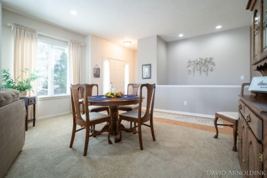 This immaculate 2 bedroom, 2 1/2 bath condo in The Links at on The Links At Rolling Meadows in Michigan - for sale on GolfHomes.com, golf home, golf lot