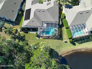 Warm and inviting 4 BR pool home with lake and fountain view on Plantation Bay Golf and Country Club in Florida - for sale on GolfHomes.com, golf home, golf lot