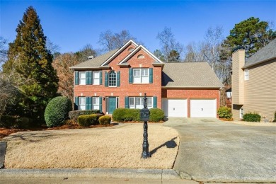 Welcome home! This beautifully updated and maintained brick on Towne Lake Hills Golf Club in Georgia - for sale on GolfHomes.com, golf home, golf lot