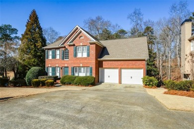 Welcome home! This beautifully updated and maintained brick on Towne Lake Hills Golf Club in Georgia - for sale on GolfHomes.com, golf home, golf lot