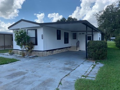 Time to buy is now! This beautiful, totally renovated 2/1.5 bath on Lake Henry Golf Club in Florida - for sale on GolfHomes.com, golf home, golf lot