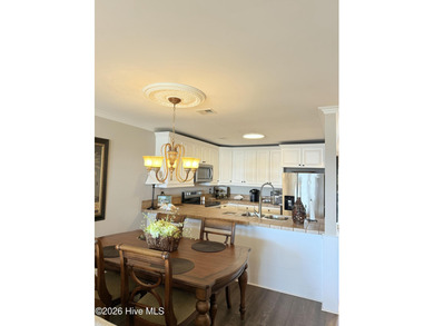 Welcome to coastal living at its finest. This luxurious home on Brick Landing Plantation Yacht and Golf Club in North Carolina - for sale on GolfHomes.com, golf home, golf lot