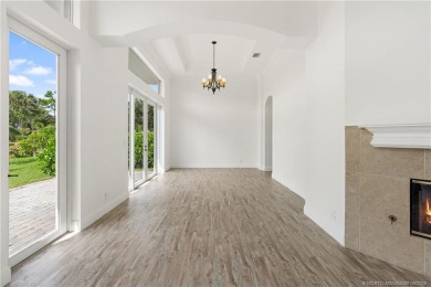 Welcome to your own private sanctuary-an elegant courtyard pool on The Cape Club of Palm City in Florida - for sale on GolfHomes.com, golf home, golf lot