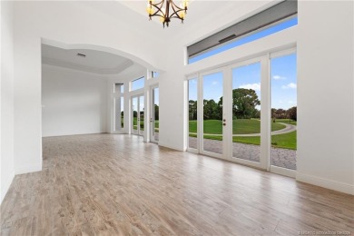 Welcome to your own private sanctuary-an elegant courtyard pool on The Cape Club of Palm City in Florida - for sale on GolfHomes.com, golf home, golf lot