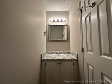 Welcome to this beautifully renovated 3-bedroom, 2-bathroom home on Hope Mills Golf and Country Club in North Carolina - for sale on GolfHomes.com, golf home, golf lot