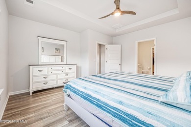 Welcome to your pristine coastal retreat! Situated on a on Brunswick Plantation and Golf Resorts in North Carolina - for sale on GolfHomes.com, golf home, golf lot