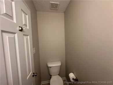 Welcome to this beautifully renovated 3-bedroom, 2-bathroom home on Hope Mills Golf and Country Club in North Carolina - for sale on GolfHomes.com, golf home, golf lot