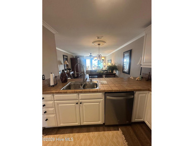 Welcome to coastal living at its finest. This luxurious home on Brick Landing Plantation Yacht and Golf Club in North Carolina - for sale on GolfHomes.com, golf home, golf lot